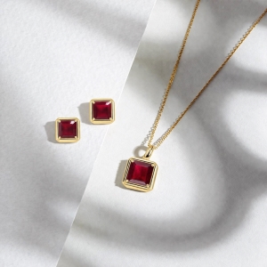 gold jewelry in glass filled ruby collection by JewelPin